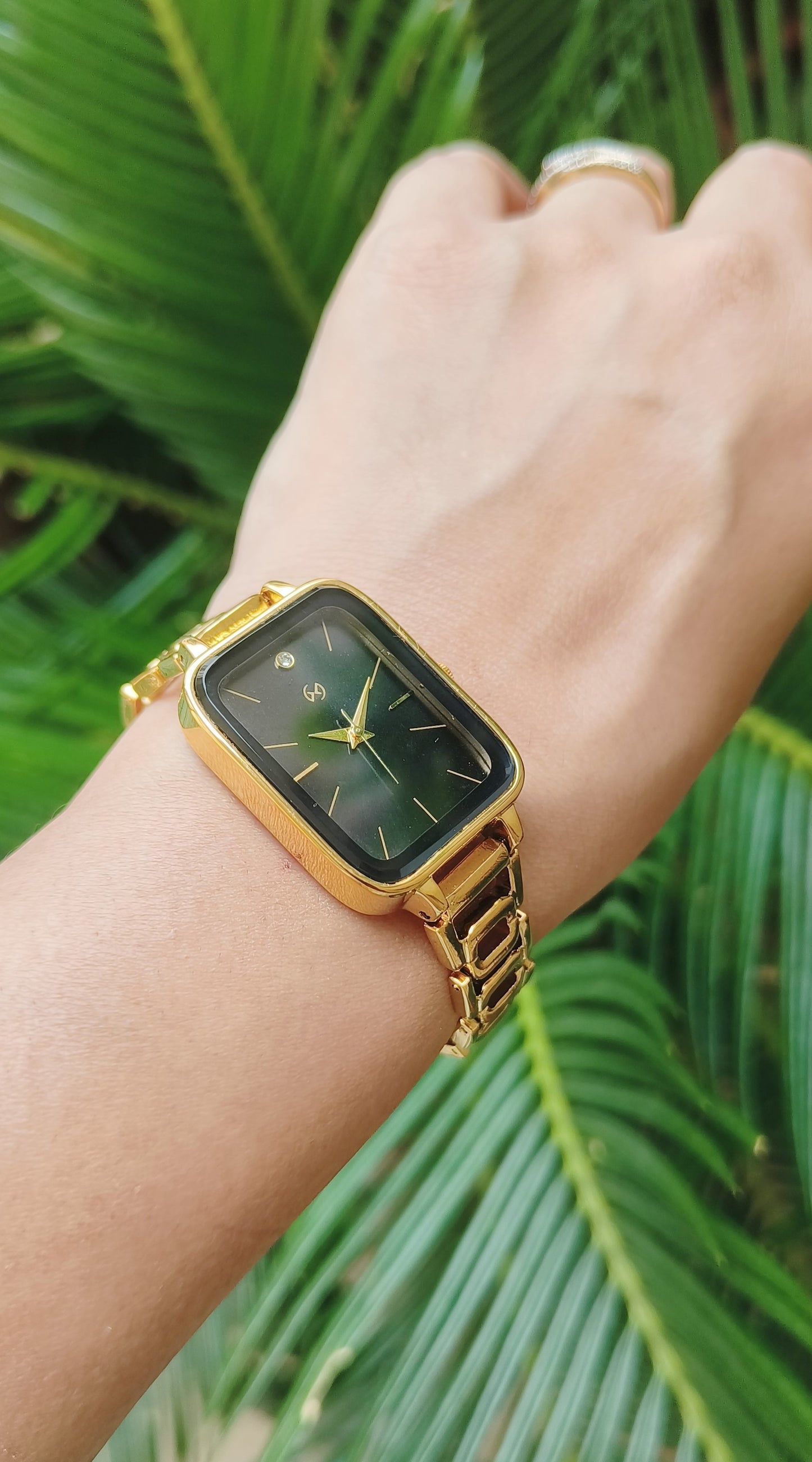Bestseller Rectangular case Women Gold watch with black minimalist dial