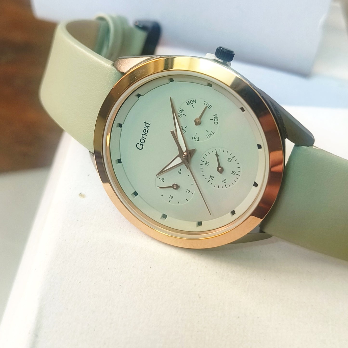Multifunction pistachio green dial with black and rose goldcase : day ,month and week display watch for men
