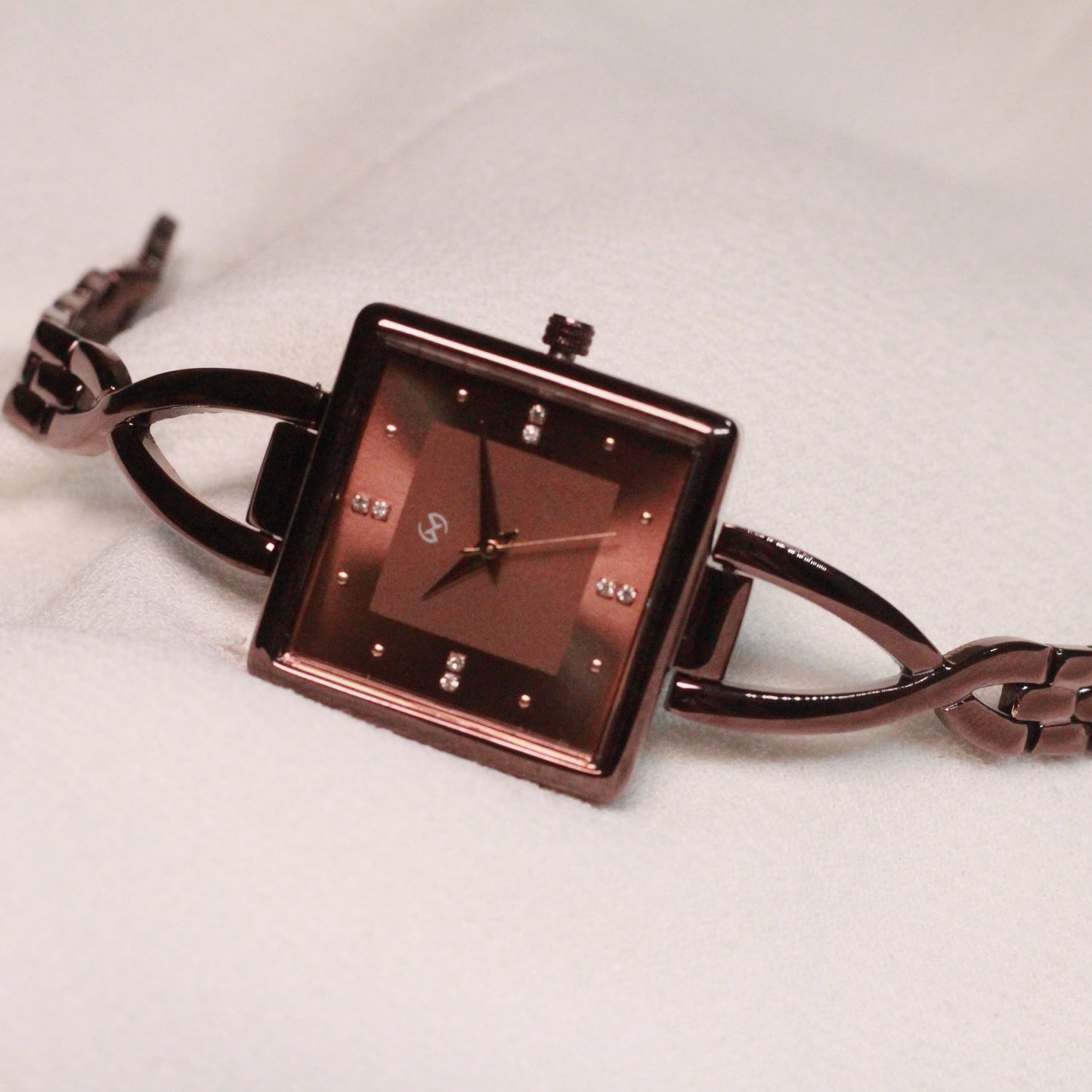Brown watch in square case in bangle style with embellished index