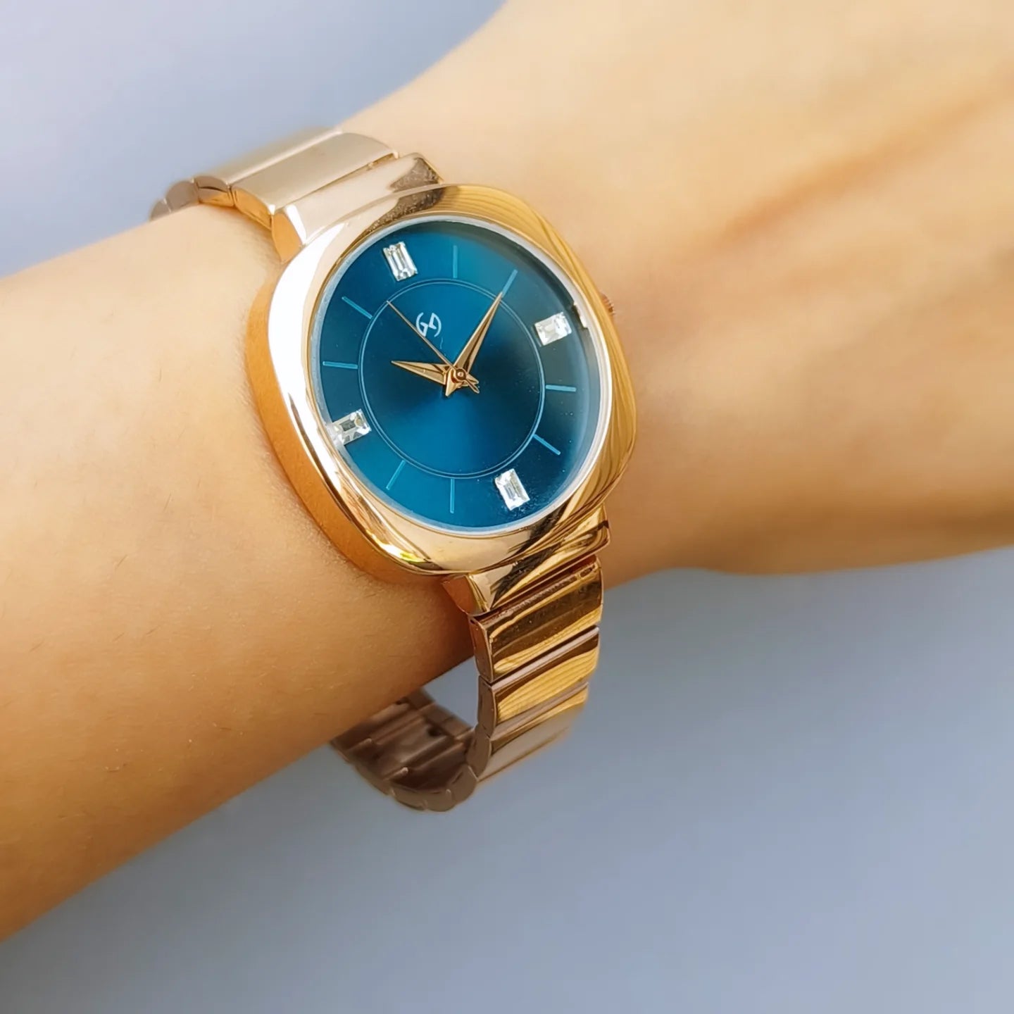 Minimalist and trendy blue dial watch with rose gold rectangular link chain perfect for office and daily wear