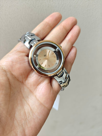 Designer and heavy look Steel watch with rosegold rim and transparent outer ring