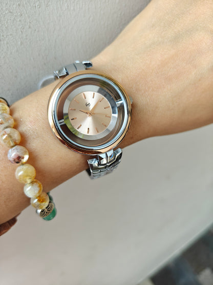 Designer and heavy look Steel watch with rosegold rim and transparent outer ring