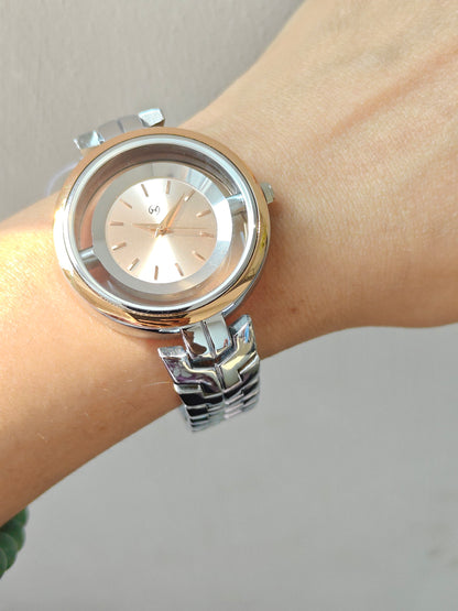 Designer and heavy look Steel watch with rosegold rim and transparent outer ring