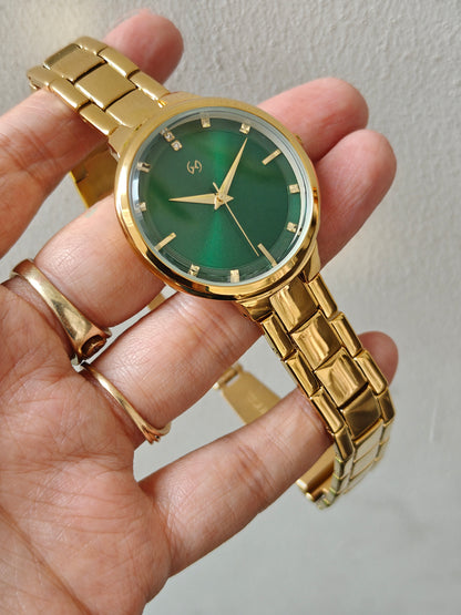 Bestseller gold watch with green sunray dial