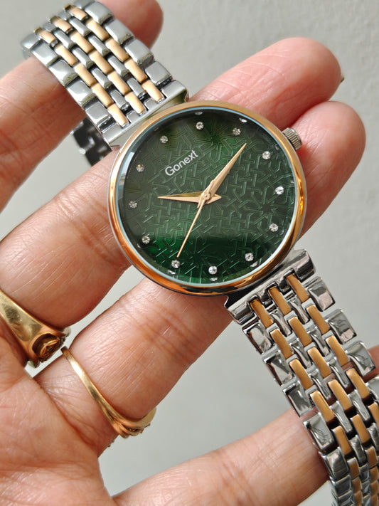 Modern european style green dial watch with embossed dial details in two tone chain