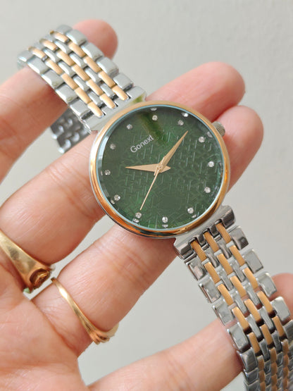Modern european style green dial watch with embossed dial details in two tone chain