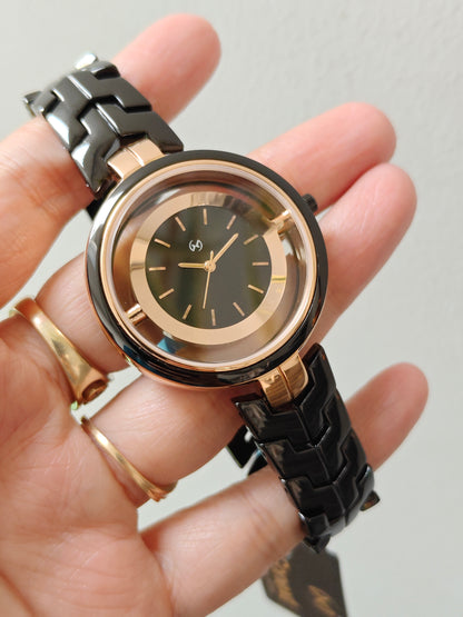 Designer and heavy look balck rose gold watch with transparent outer ring