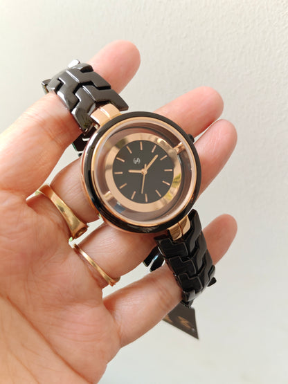 Designer and heavy look balck rose gold watch with transparent outer ring
