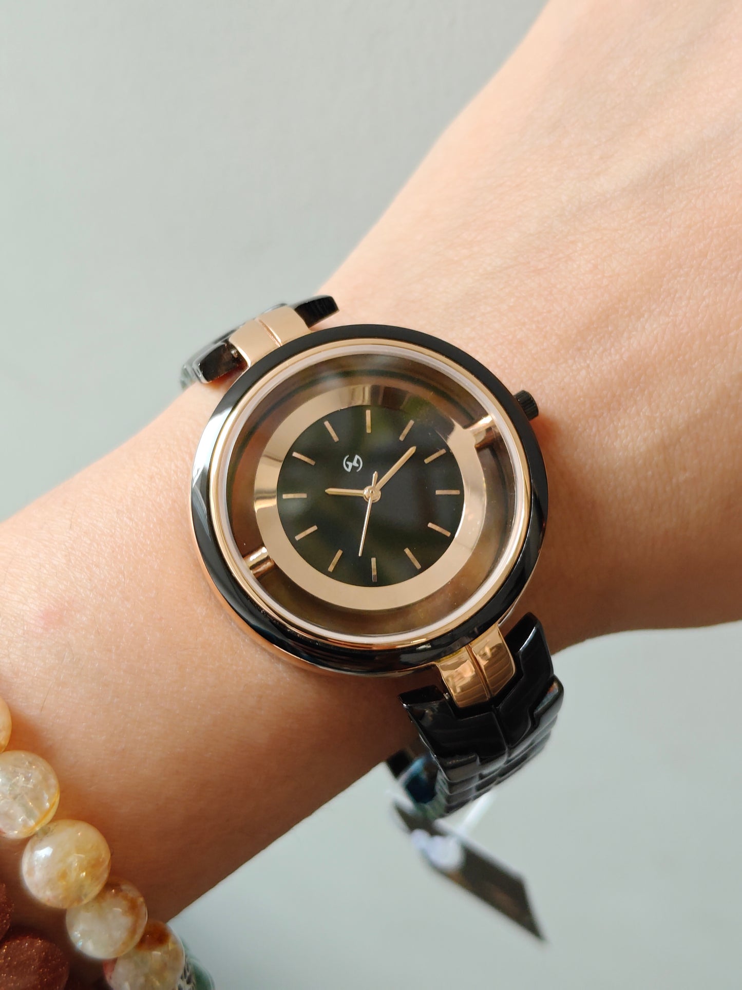Designer and heavy look balck rose gold watch with transparent outer ring