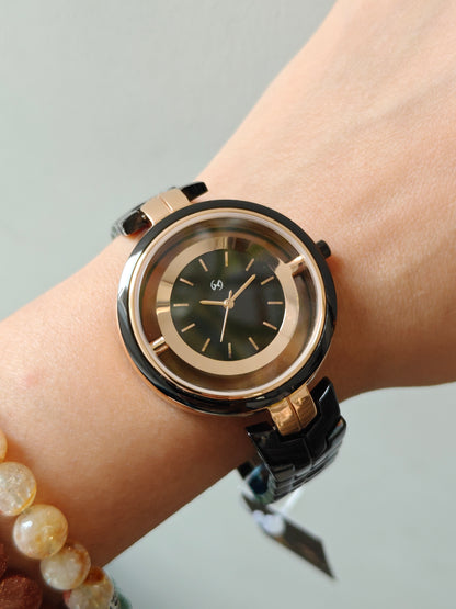 Designer and heavy look balck rose gold watch with transparent outer ring