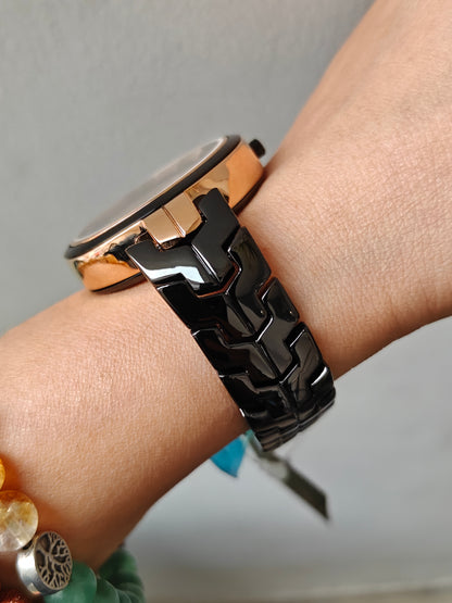 Designer and heavy look balck rose gold watch with transparent outer ring
