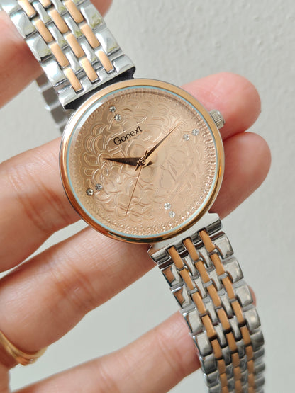 Modern european style watch with embossed dial details in two tone chain
