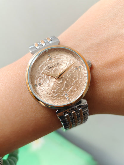 Modern european style watch with embossed dial details in two tone chain