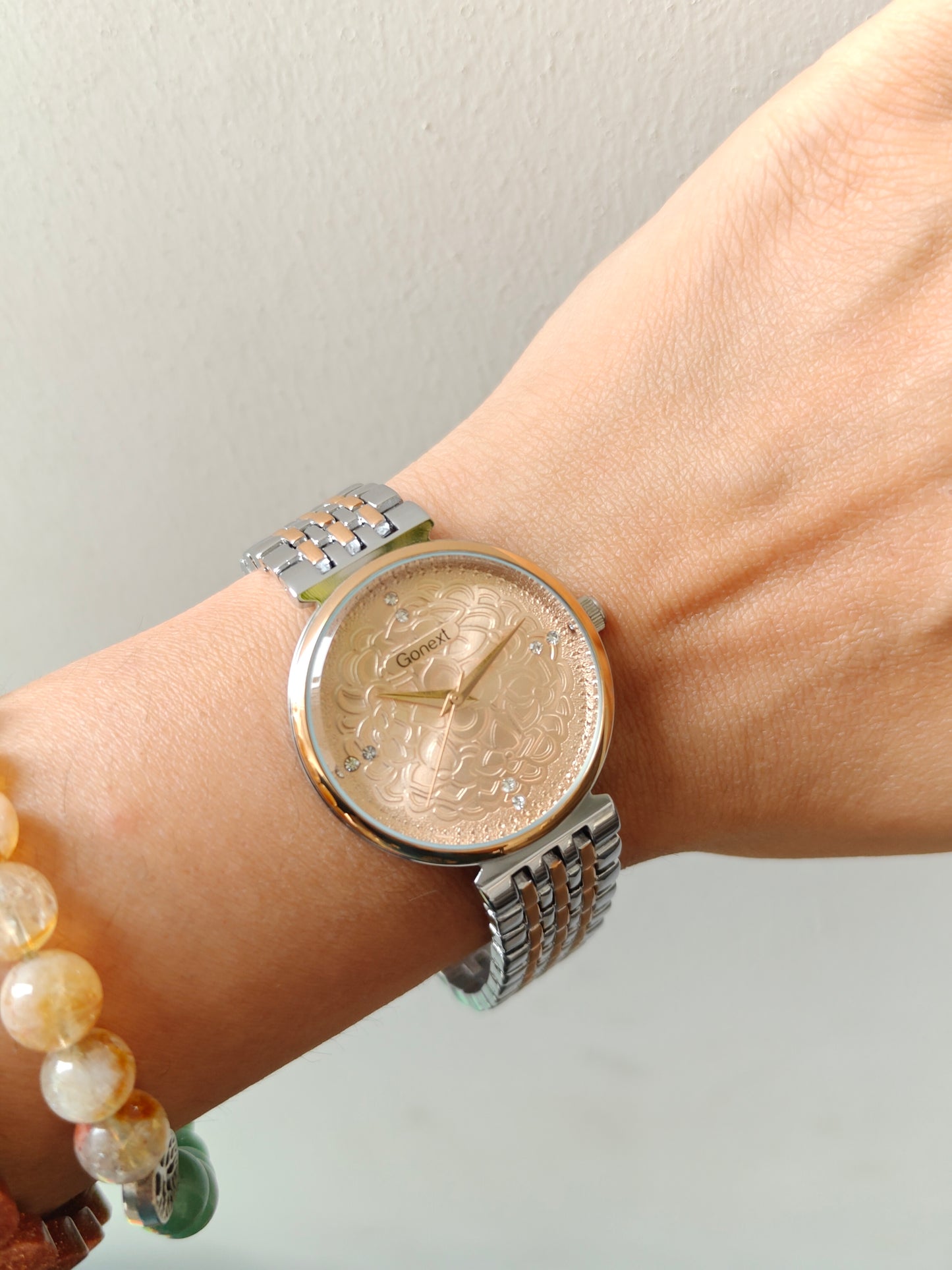 Modern european style watch with embossed dial details in two tone chain