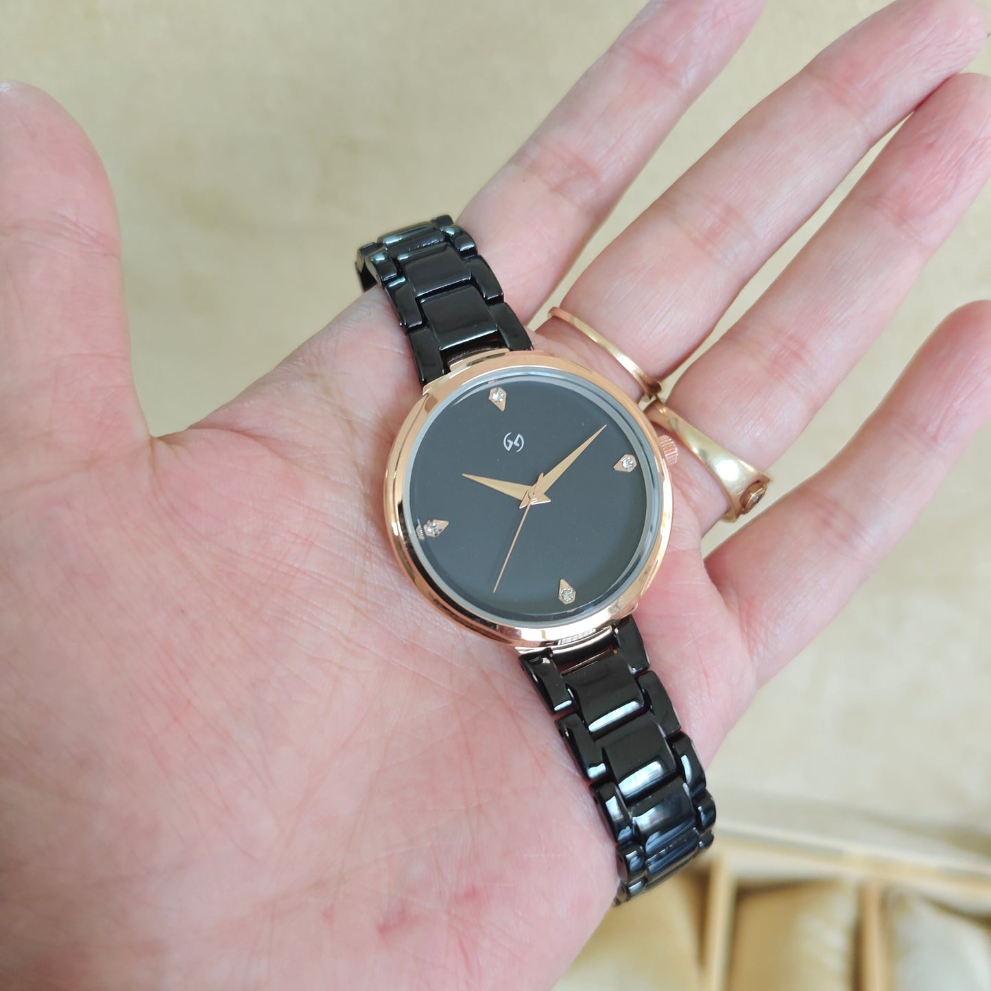 Womens premium feel , ceramic look style watch in stainless steel metal black with minimal dial
