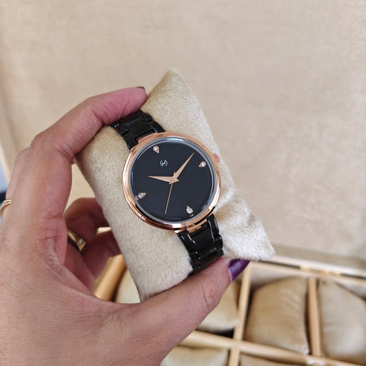 Womens premium feel , ceramic look style watch in stainless steel metal black with minimal dial