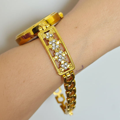 Women's 18 k original gold plating watch with embelished bangle style chain and balck dial