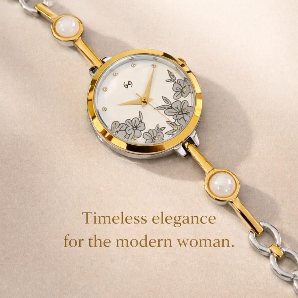 Designer gold watch with unique chain in shiny pearl with steel touch and floral dial