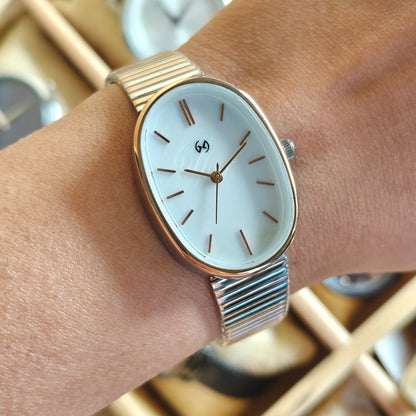 Modern style oval watch with white MOP dial and soft two tone chain self adjustable watch