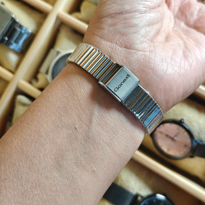 Modern style oval watch with white MOP dial and soft two tone chain self adjustable watch