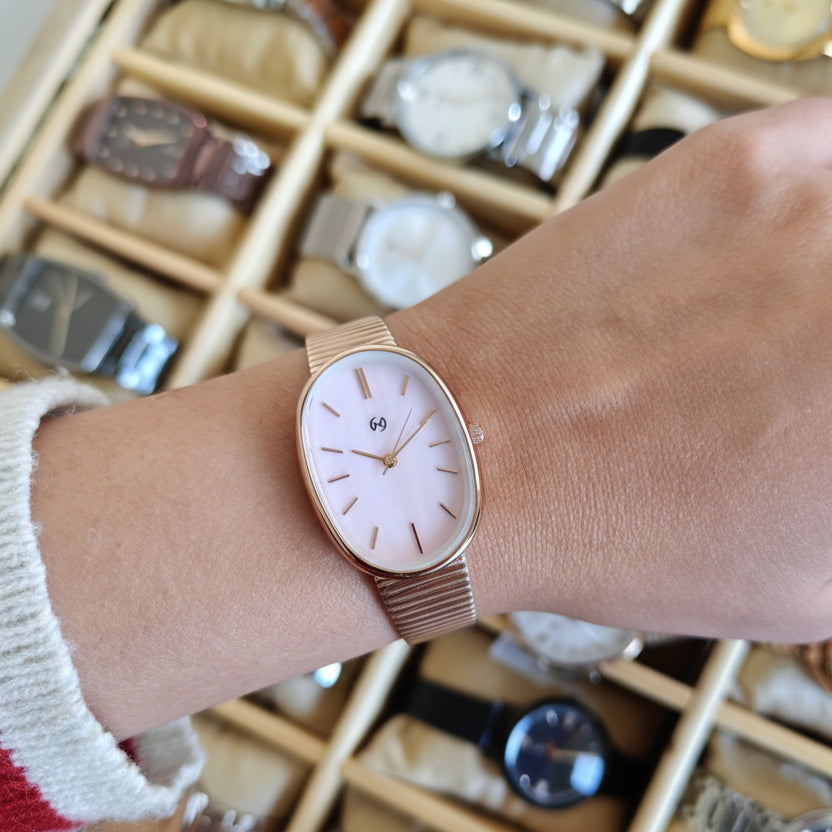 Modern style oval watch with BABY PINK MOP dial and full rose gold chain self adjustable watch