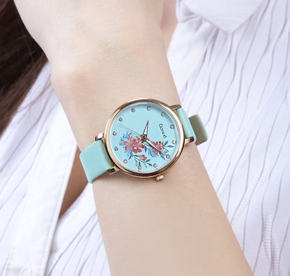 Pastel green strap watch with 3d floral detailing dial