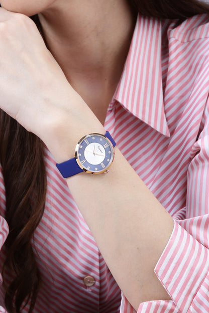 Vibrant blue strap watch with floral index and roman numerals