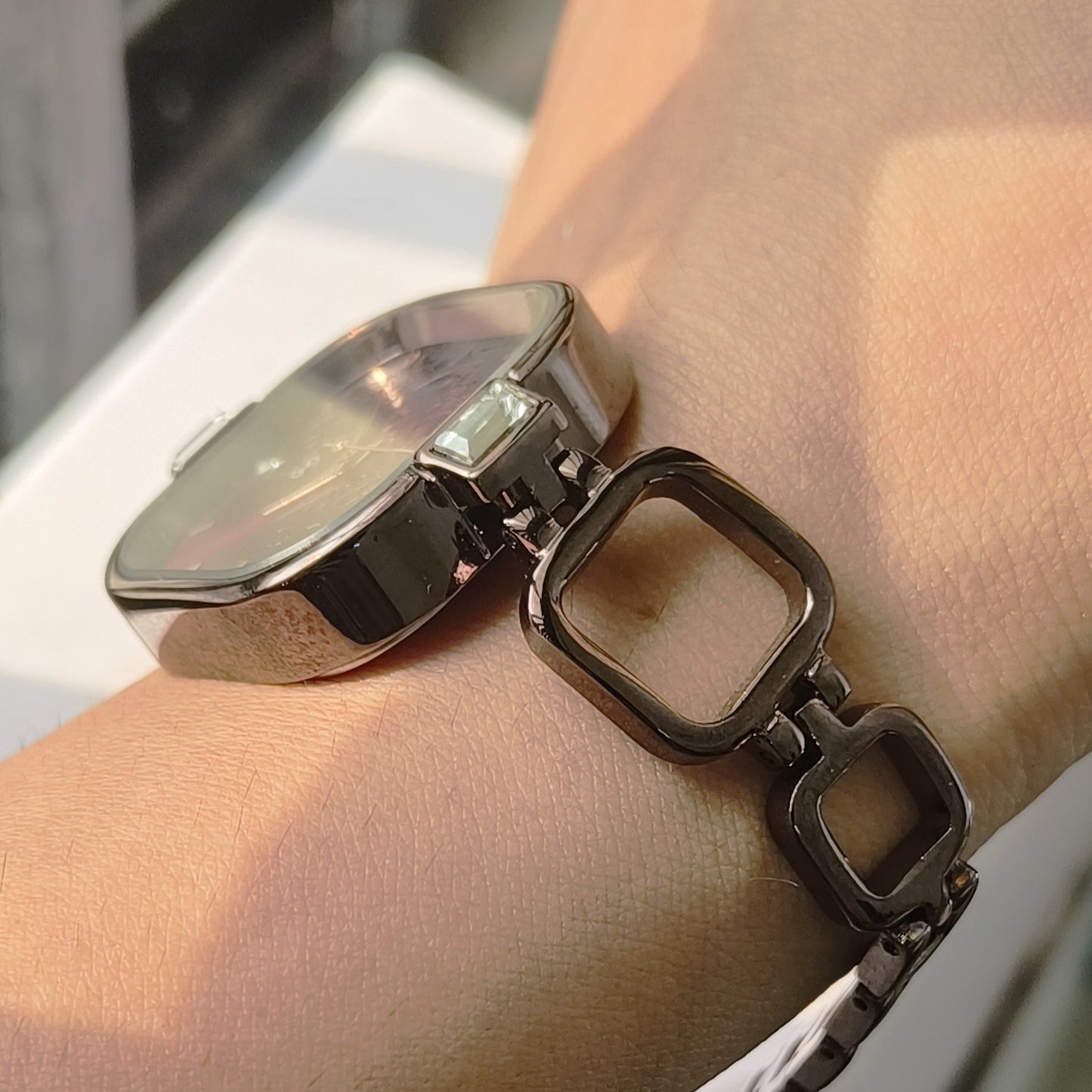 Unique brown watch with dark maroon dial in square case