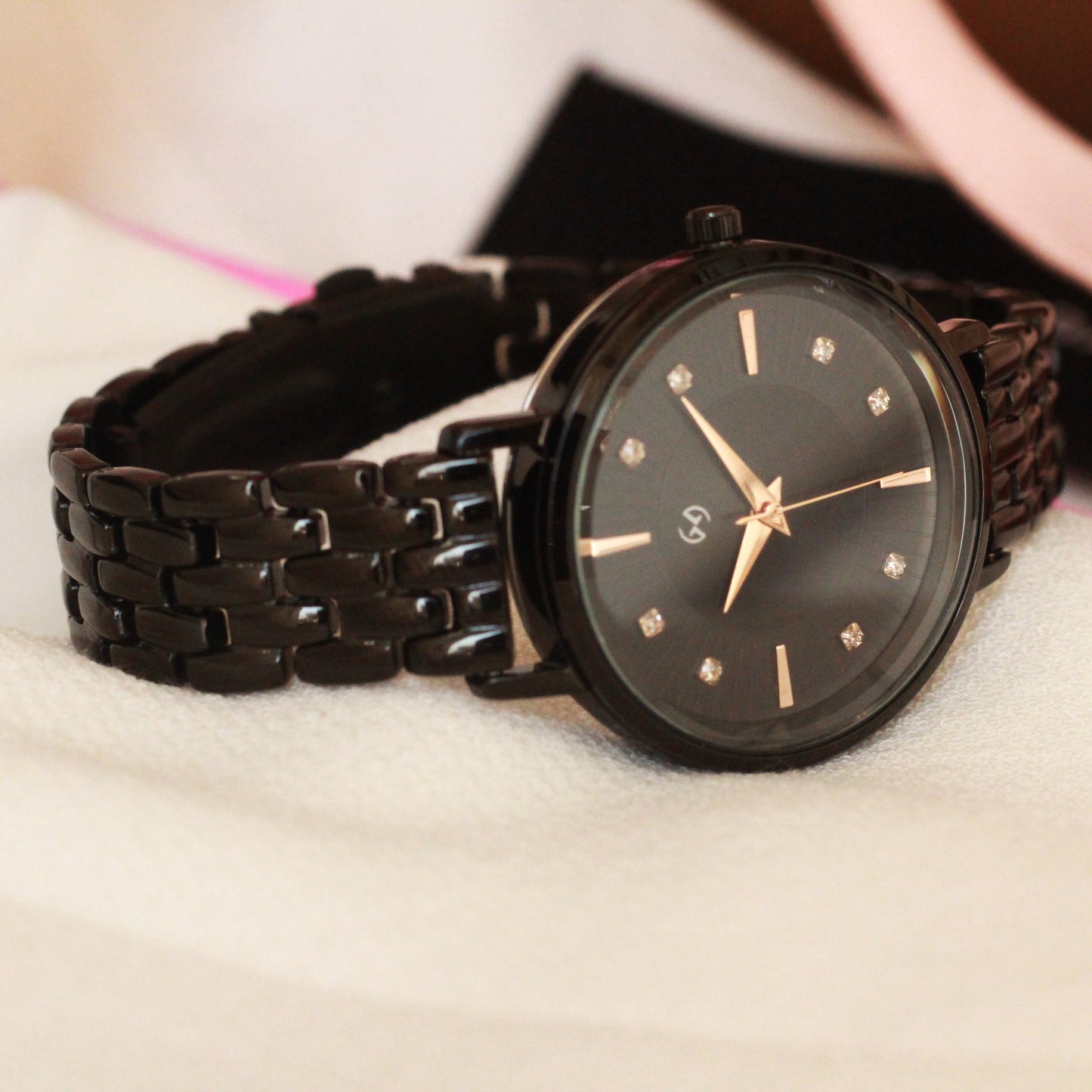 The black beauty with embellished and textured dial featuring European style chain for women