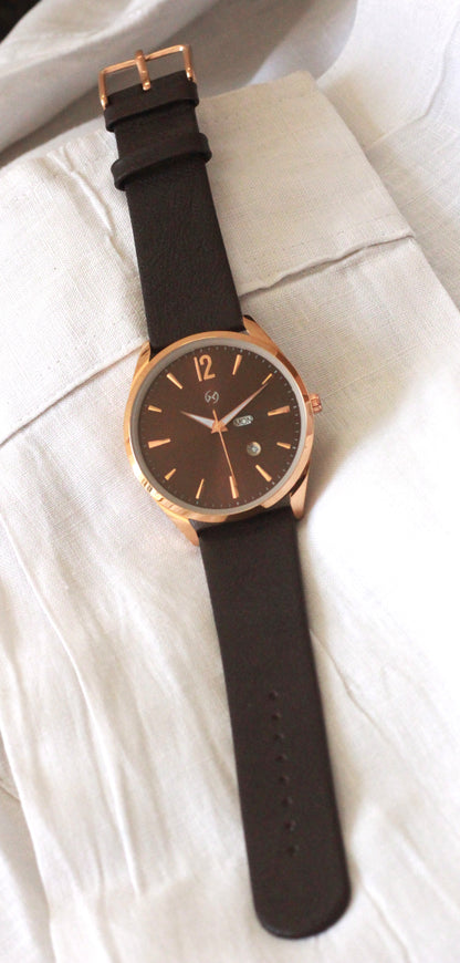 Formal watch for men with rose gold case and dark brown strap with day and date